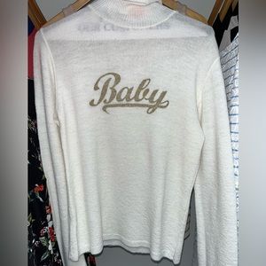 Casting Made in France “Baby” sweater. Professionally dry cleaned only.